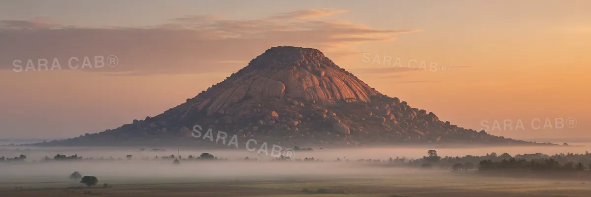 Arunachala hill rising above the plain at Tiruvannamalai